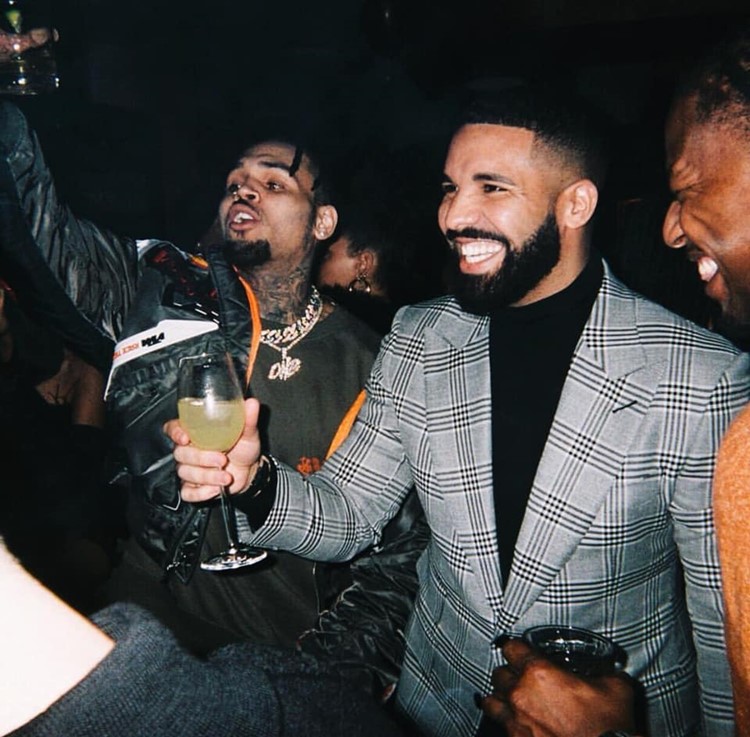 Delilah restaurant Los Angeles famous celebrity Drake show up having fun drinking cocktails party clubstaurant