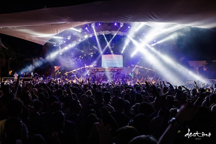 Destino nightclub Ibiza crowd at big concert event lights show