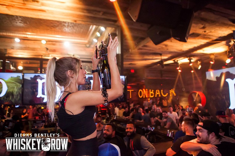 Whisky Row club in Arizona bubbles parade bachelor celebrate bottle service waitress