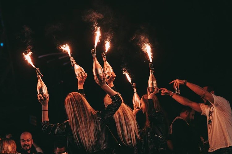 Drai's DXB nightclub Dubai alcohol bottles service table reservation vodka rum champagne expensive luxury cocktails drinks