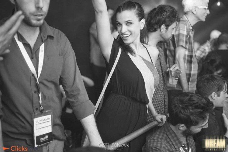 Dream Exhibition nightclub Tel Aviv girl having fun dancing drinking cocktails alcohol bottles champagne vip area