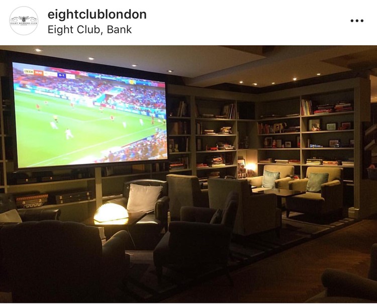 TV screen in the library of the Eight members club