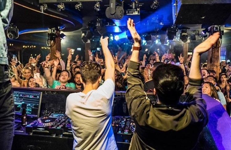 Electric Hotel nightclub Chicago djs having fun mixing music crowd partying