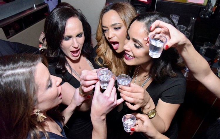 Elevate Lounge nightclub Los Angeles girls doing shots guest list alcohol fun nightout
