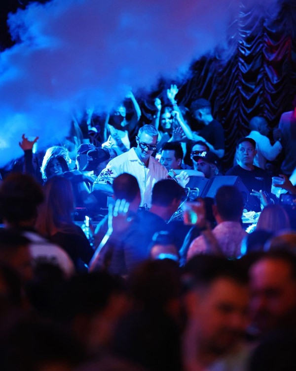 Encore Beach club at night Las Vegas DJ Diplo mixing music live techno house pop book your vip table reserve now