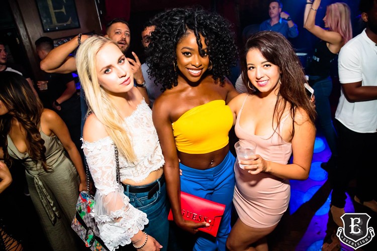 Everleigh nightclub Toronto three sexy pretty blonde brunette girls having fun drinking