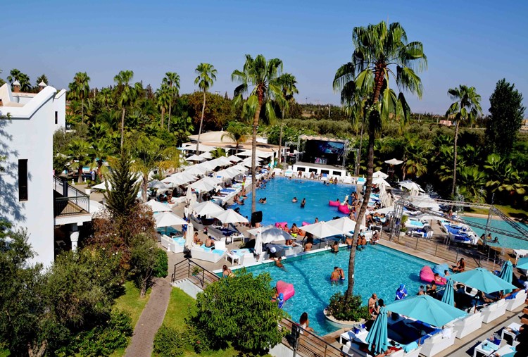 Famous Beach club Marrakech location outdoor venue swimming pool fun events