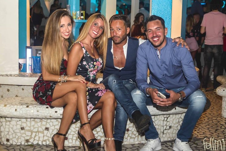 Fellini Club nightclub Milan girls and men drinking sexy