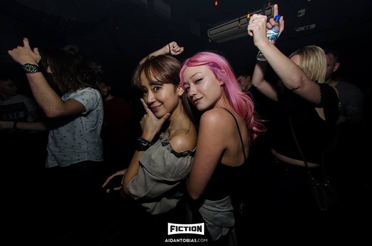 Fiction club nightclub Cape Town party two pretty girls drinking