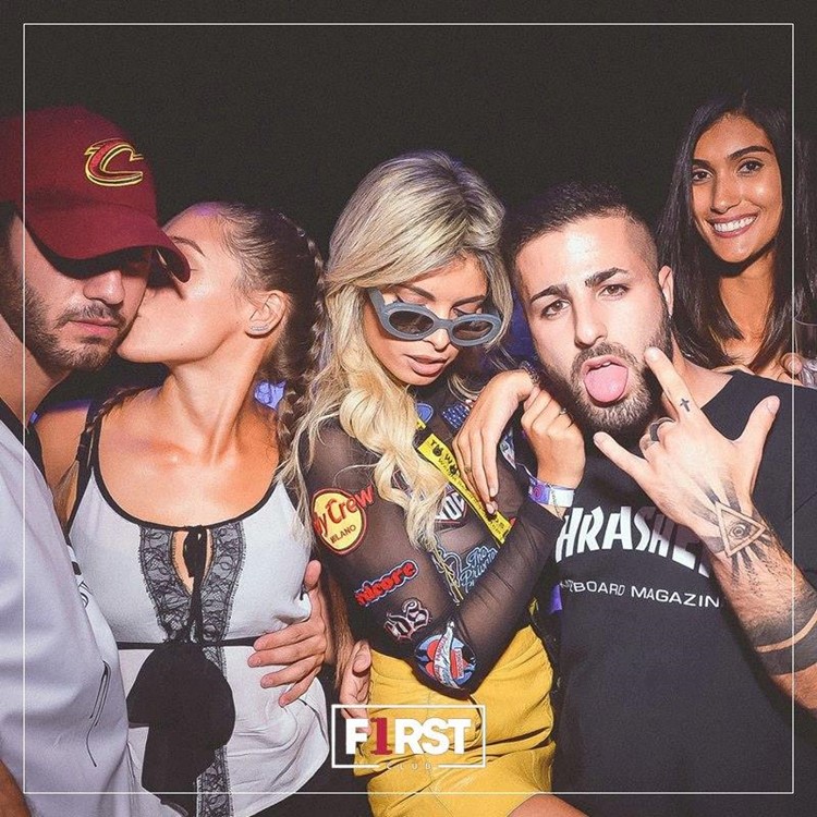 First Club nightclub Milan sexy girls and boys having fun all night partying dancing drinking