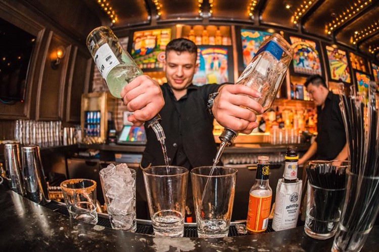 Fishbowl nightclub New York City barman mixing alcohol vodka gin cocktails drinks party fun nightout nyc