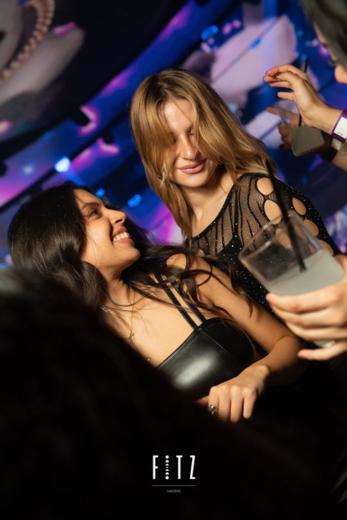 Fitz nightclub in Madrid girls having fun clubbing dancing partying drinking 