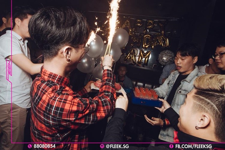 Fleek nightclub Singapore table reservation service alcohol bottles champagne vodka celebration