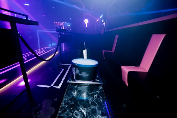 Fleek nightclub Singapore table service alcohol bottles area