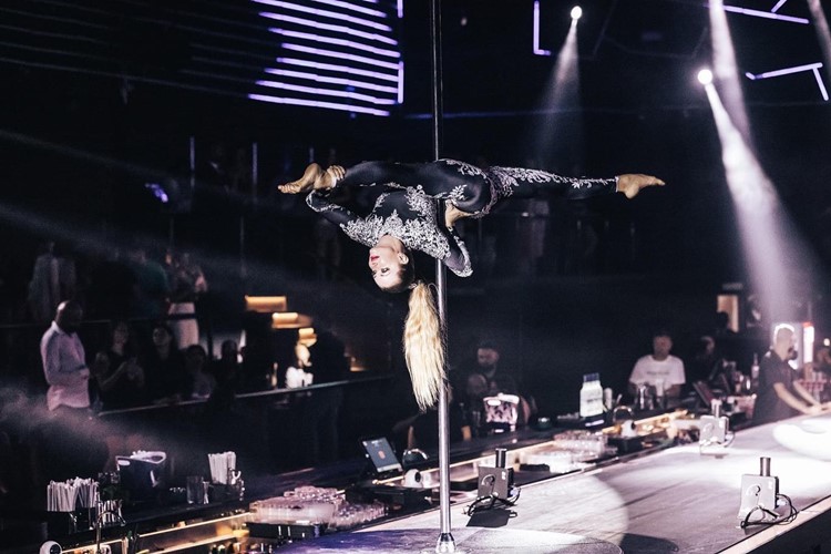 Float nightclub Dubai clubbing dancer exotic show pole 