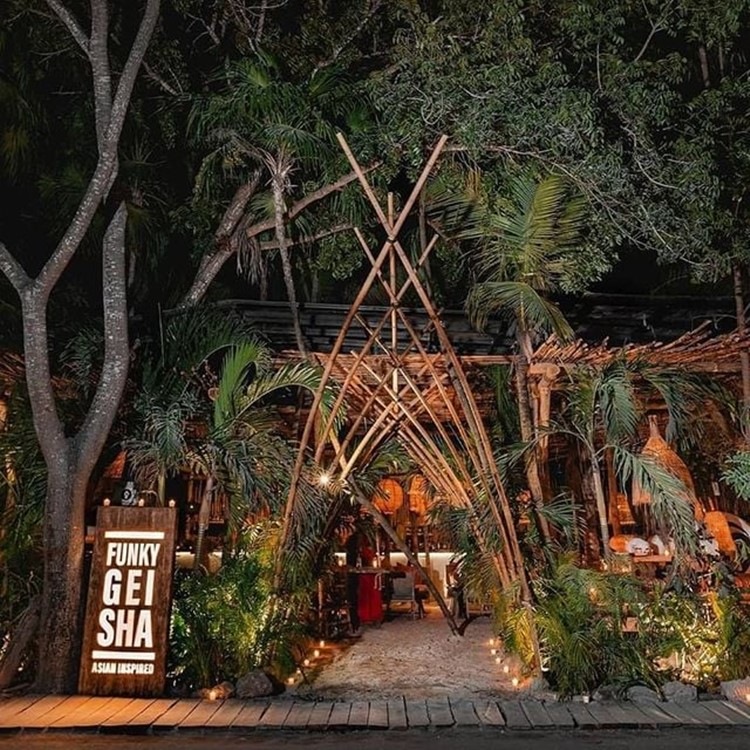 Funky Geisha club in Tulum restaurant entrance palm trees tropical chic bohemian