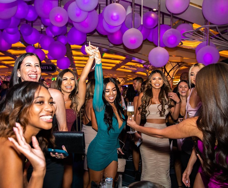 Gatsby Lounge Las Vegas pretty girls ladies celebrating birthday hen parties bubbles champagne parade
