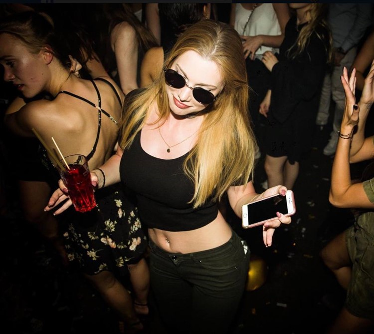 Golden Cut nightclub Hamburg pretty blonde girl dancing