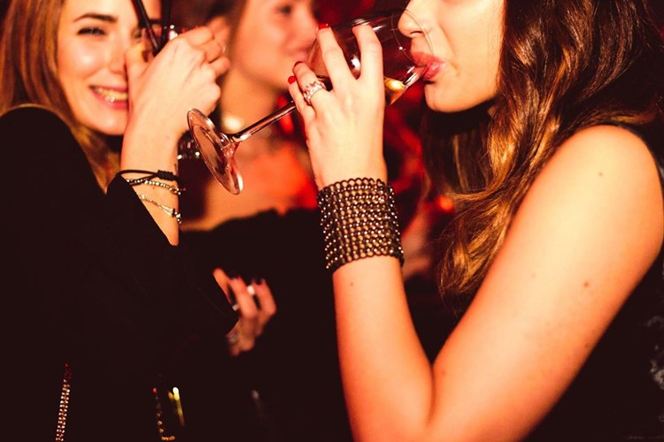 Gus nightclub Rome girls drinking champagne cocktails alcohol drinks beverages partying dancing