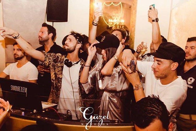 Guzel nightclub Mykonos dj guys mixing music live dress code males fun night