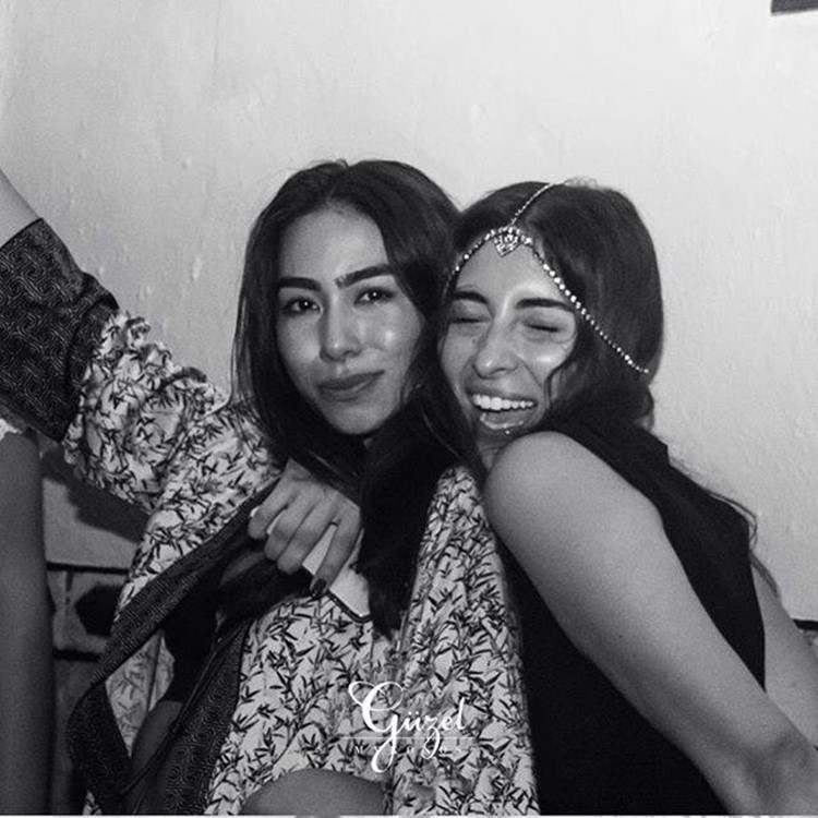 Guzel nightclub Mykonos girls having fun partying pretty brunette guest list