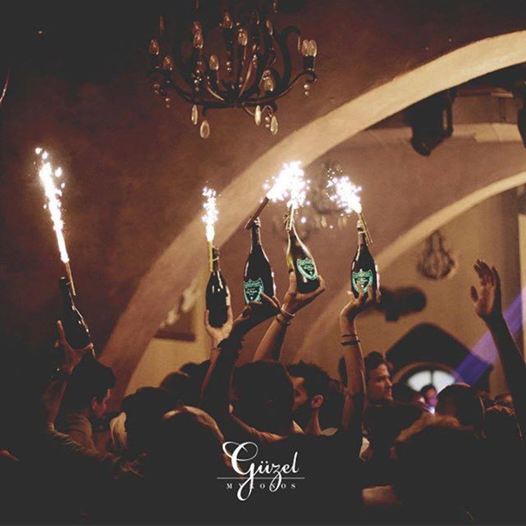 Guzel nightclub Mykonos champagne parade show event party cocktails alcohol drinks