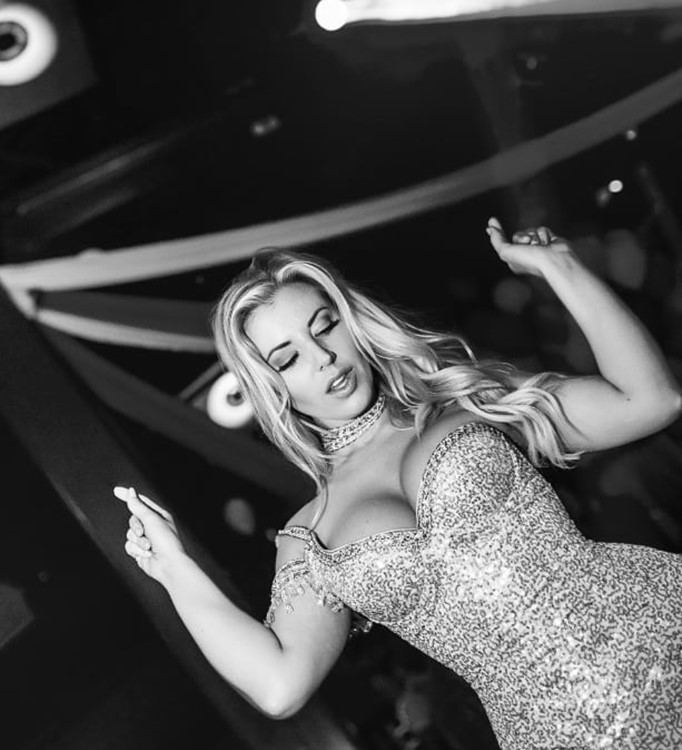 HRoof nightclub Cancun sexy blonde girl in tight dress having fun dancing all night music party