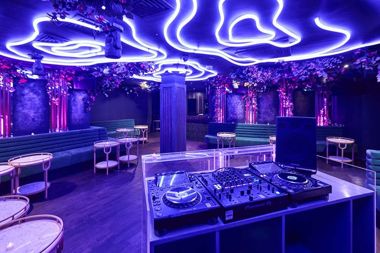 Helios Club London banquette tables