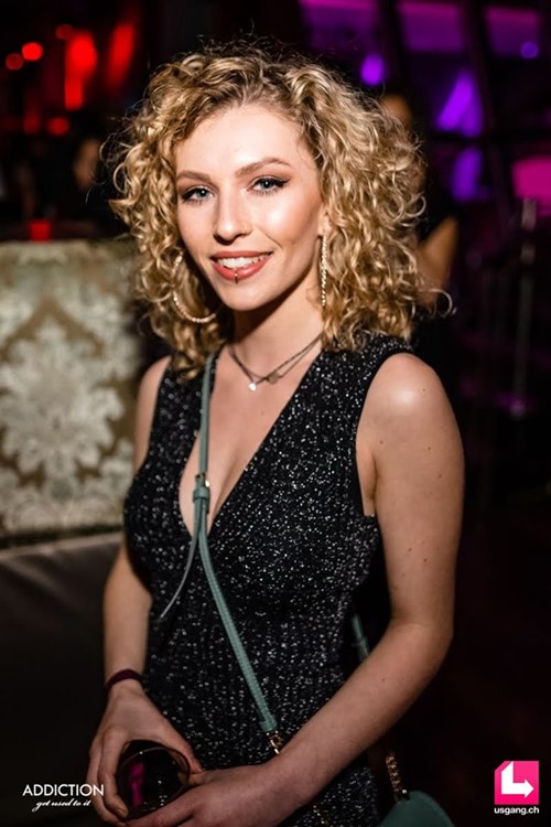 Hiltl nightclub Zurich pretty blonde girl drinking fun night party event dance