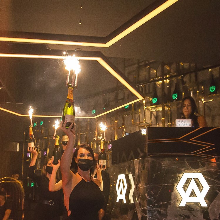 Hookaai club Barcelona bottle service alcohol champagne parade celebration