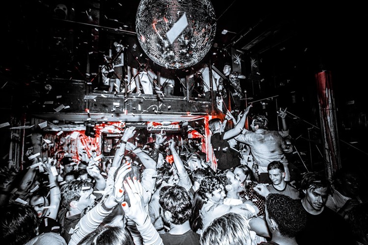 Hornsleth nightclub Copenhagen disco ball dance floor crowd party all night 