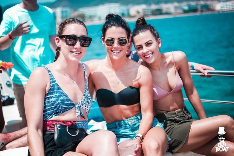 IBZ Boat Party Ibiza girls having fun drinking in bikinis