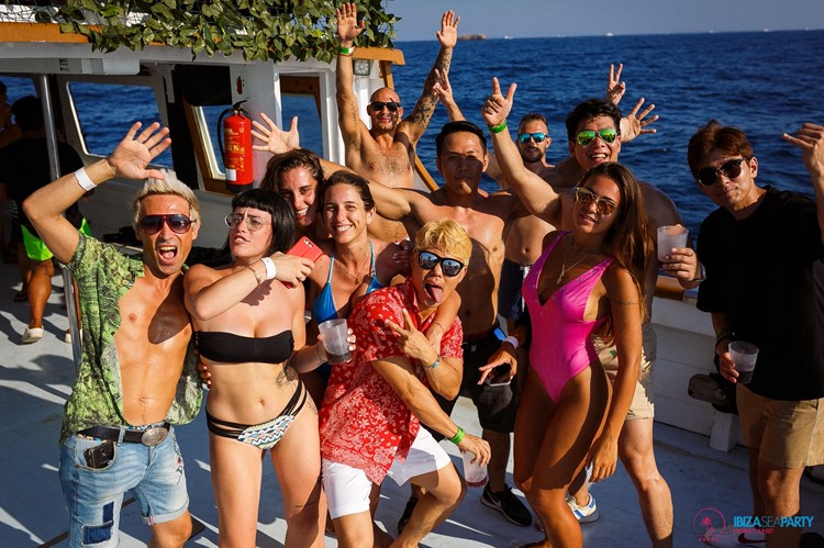 Sea Party Ibiza yacht people having fun sexy girls dancing