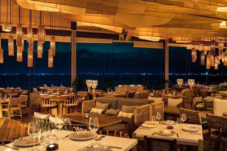 Ilios in Tulum restaurant club table seating reserve book now