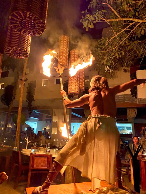Ilios in Tulum restaurant club fire show event party book now