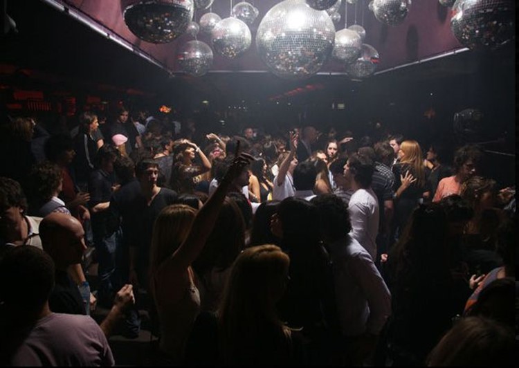 Jet nightclub Buenos Aires crowd dancing girls having fun partying disco balls