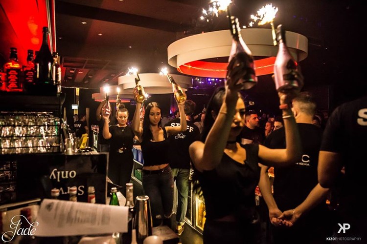 Jade Club nightclub Zurich waitresses big bottles of vodka champagne alcohol table service