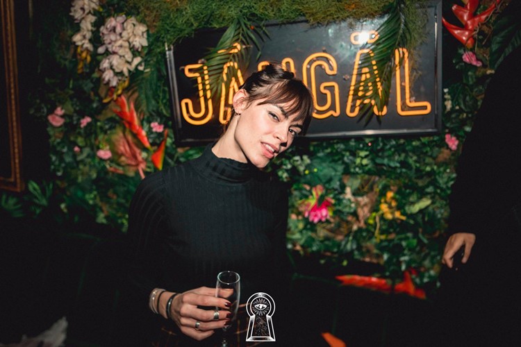 Jangal nightclub Paris pretty brunette girl having fun party drinks cocktail alcohol fun party