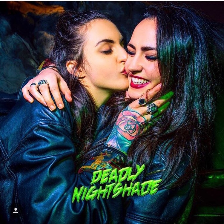 Tattooed Bryony kissing girl at the new Jungle VIP nightclub in London