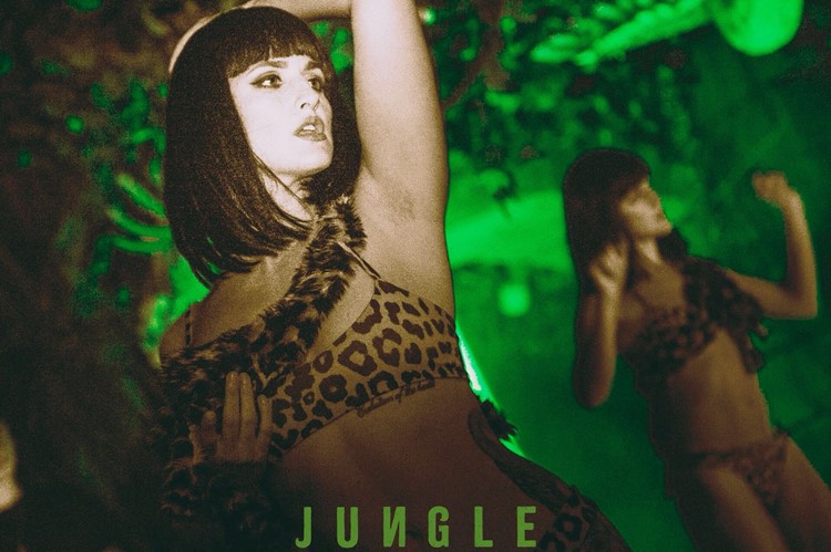 Lady in leopard patterned top at Jungle VIP nightclub in London