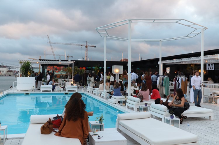 K Urban Beach nightclub Lisbon people having fun drinking by the swimming pool 