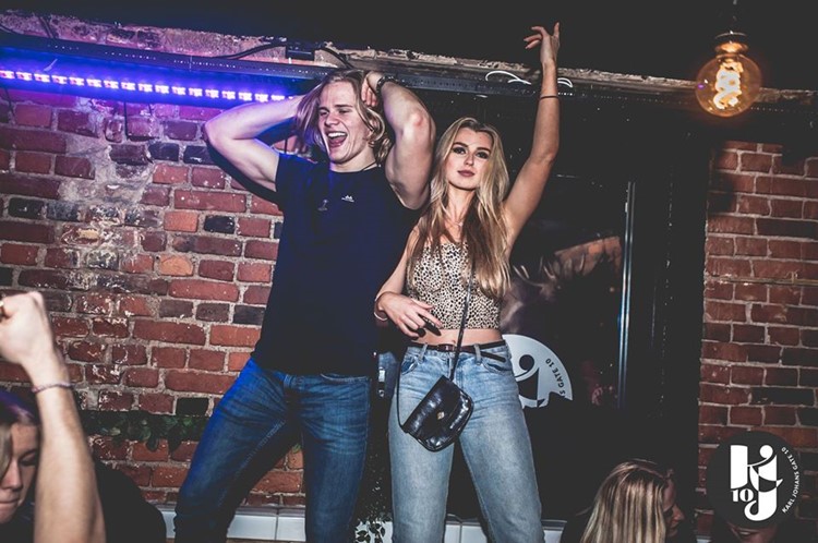 KJ10 nightclub Oslo pretty blonde girl and guy dancing all night drinking having fun
