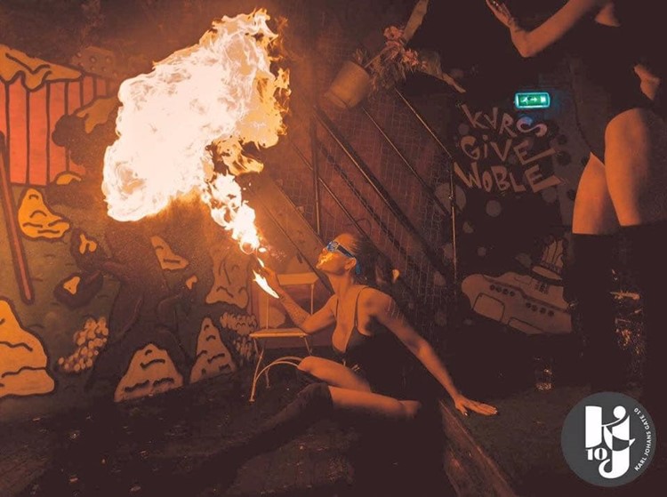 KJ10 nightclub Oslo exotic dancer blowing fire show stage event must see place