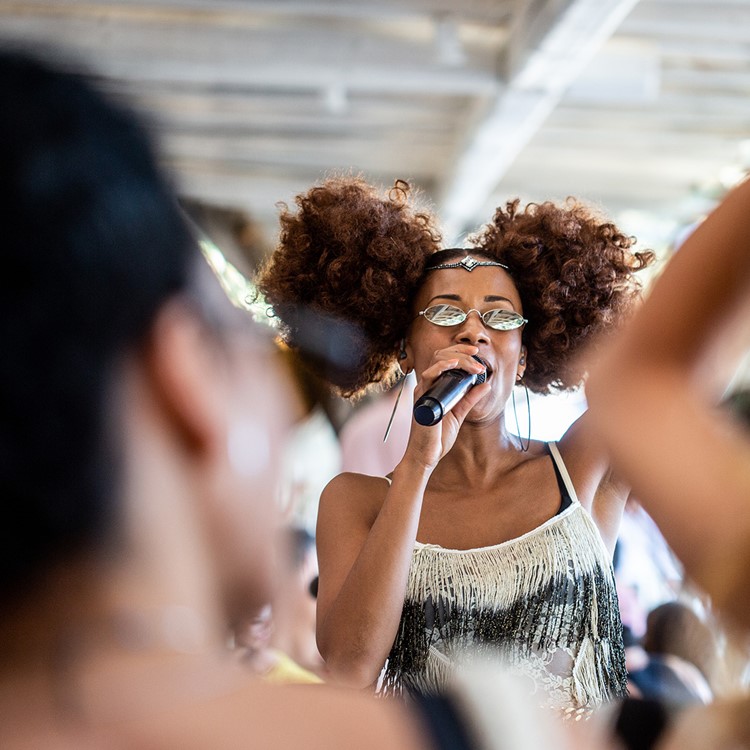 Kalua club Mykonos beach club day time partying live concert music event