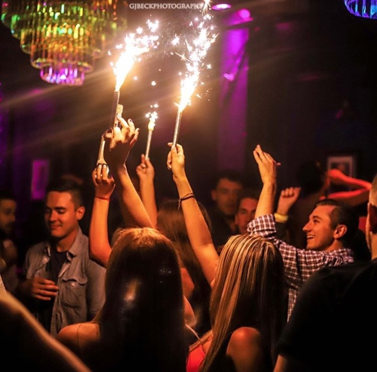 Key Club nightclub Chicago girls holding sparkles party people having fun