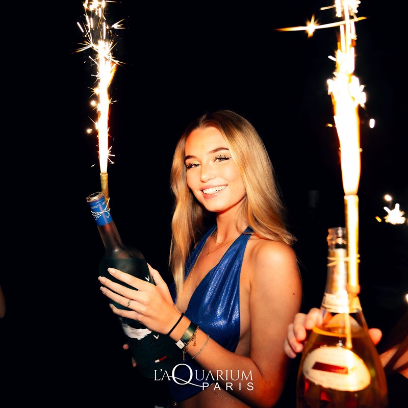 L'Aquarium nightclub in Paris pretty blonde girl having fun dancing clubbing partying best event