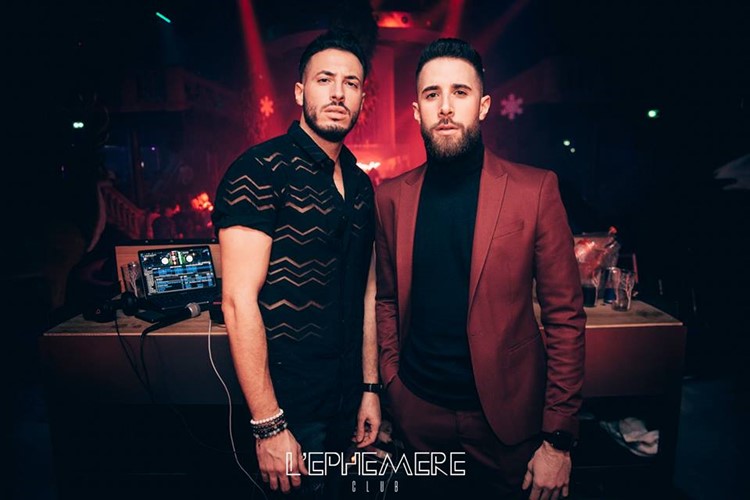 L'Ephémère Club nightclub Paris handsome men having fun djs mixing music dance floor lights show