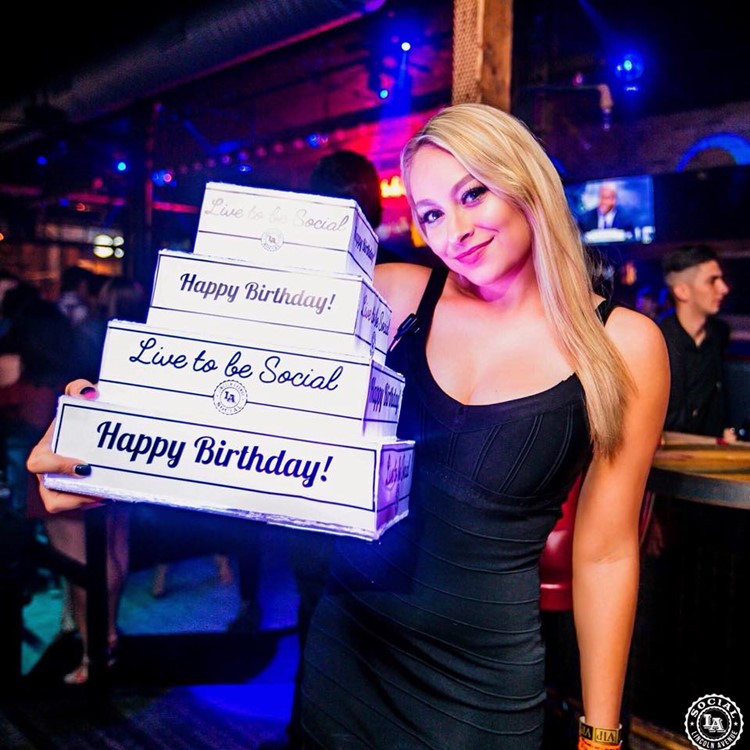 LA Social sports club Chicago sexy blonde waitress cake celebration table service fun