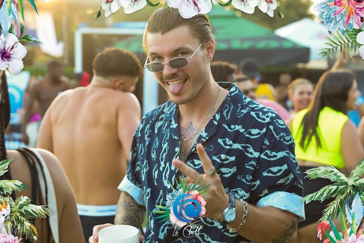 La Chill pool club Paris guy having fun vip table booking reserve now bachelor birthday hen parties