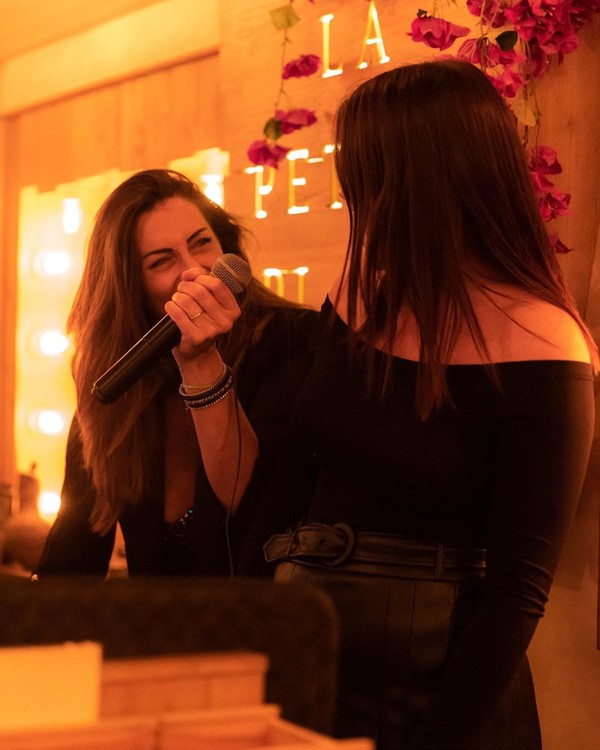 La Petite Plage restaurant club St Tropez pretty brunette girls having fun singing laughing dancing clubbing 